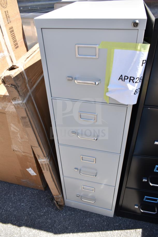 Gray Hirsh 17547 four-drawer file cabinet, 15"x25"x52", new condition with minor scratches, label area on each drawer.