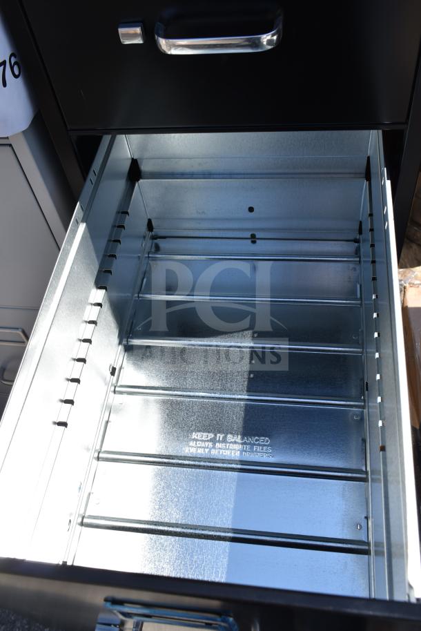 Hirsh 17892 black four-drawer file cabinet with open drawer, metal interior, scratch and dent condition. 15" x 22" x 52".