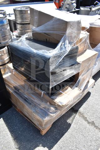 Packaged items including a cart, trash can, and folding table, shrink-wrapped on a pallet, scratch and dent condition.