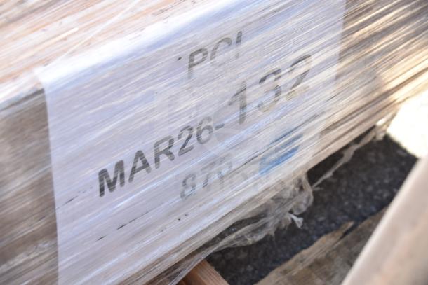 Clear wrapping over a pallet marked "MAR26-132," containing 10 brand new scratch and dent items, including pallet covers and a sink.