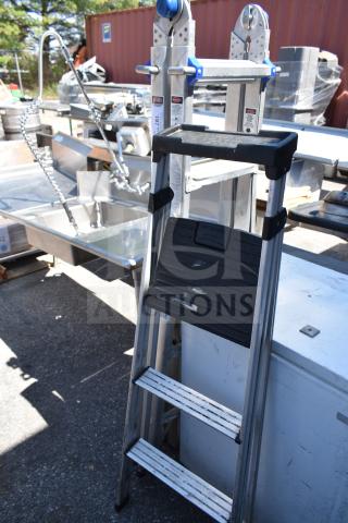 Two aluminum ladders with black steps, good condition, robust build, visible safety labels, ideal for versatile use.