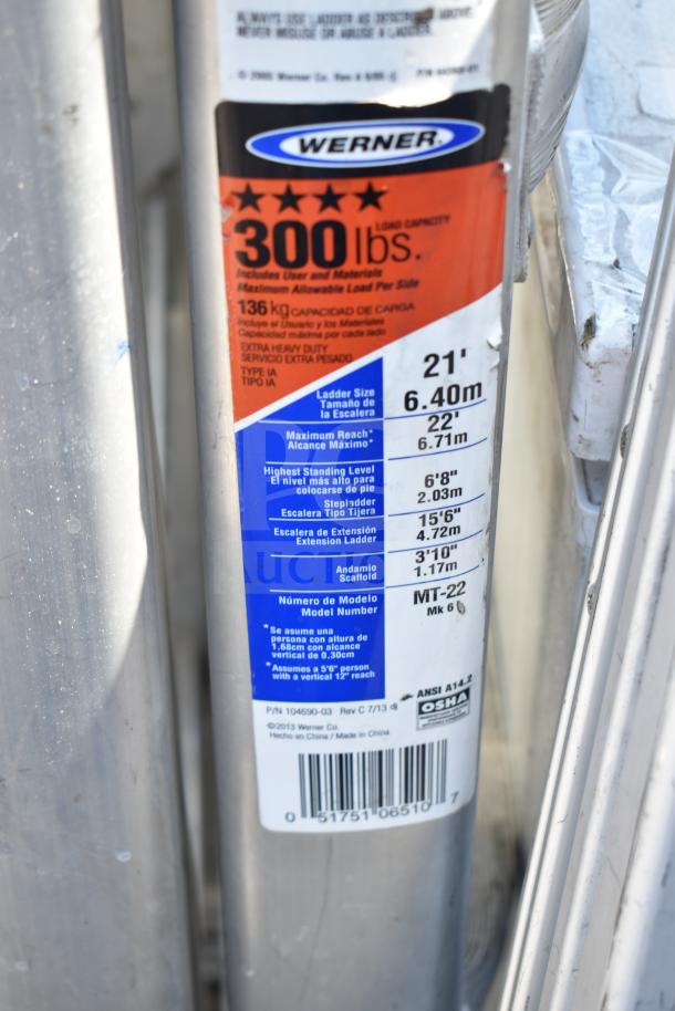 Werner MT-22 ladder, 300 lbs capacity, 21 ft reach, extra heavy duty, model details visible on label.
