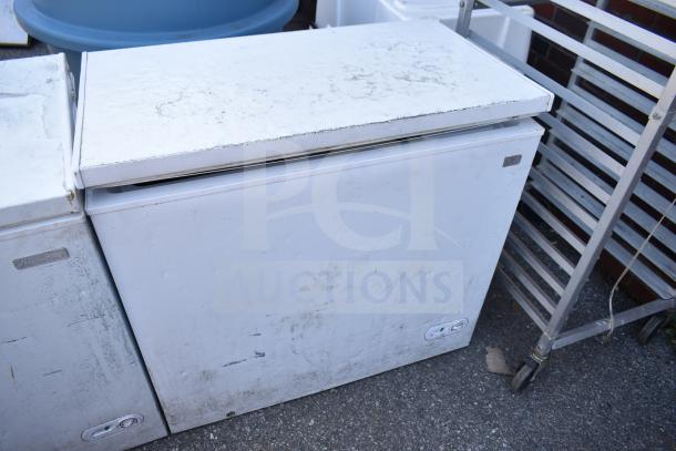2 Magic Chef HMCF5W4 chest freezers, 115 volts, 1 phase, used, showing wear, buy two with one bid.