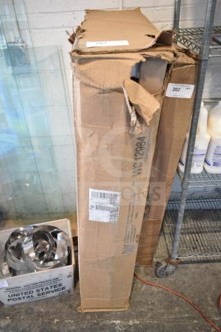 Brand new scratch and dent WC12984 sit-to-stand return, 42"W x 24"D, packaging damaged, item condition unknown.