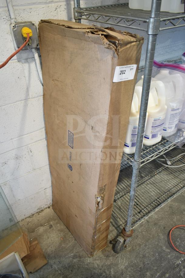 Brand new WC12977C2 unit in damaged box, labeled "202." Box shows significant wear and tear, impacts value.