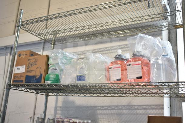 Three-tier lot with Coastwide Foaming Hand Soap, Diversey Wiwax ProX, and espresso beans on metal shelves.