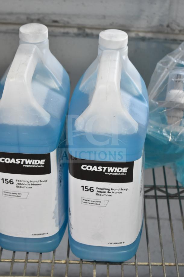 Coastwide Foaming Hand Soap jugs on a wire shelf. Labels read "156" and "washes away dirt." Part of a three-tier lot.