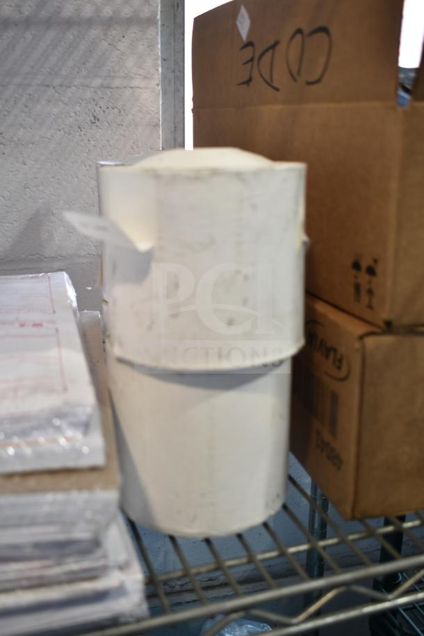 Three-tier lot featuring Coastwide Foaming Hand Soap, Diversey Wiwax ProX, and espresso beans. No shelving unit.