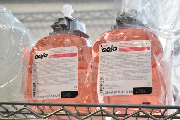 Assorted lot featuring Gojo luxury foam handwash bottles, Coastwide foaming soap, Diversey Wiwax ProX, and espresso beans.