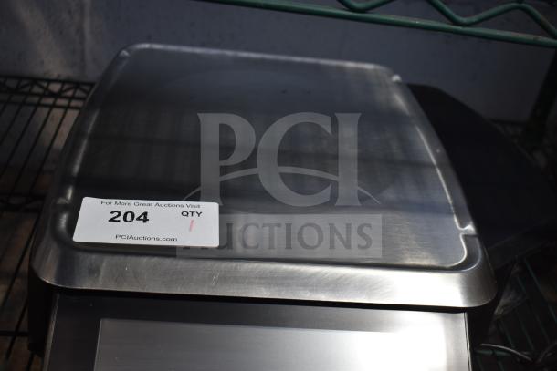 2016 Hobart HTi-7LH commercial food portioning scale, stainless steel, 120/208-240V, 1 Phase. Auction tag 204 visible.