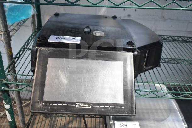 2017 Hobart HTi-7LH26 commercial scale, countertop model. Black, tested but non-functional. Signage: Lot 205.