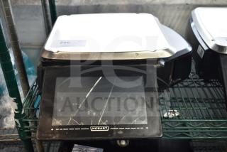 2016 Hobart HTi-7LH food portioning scale, screen cracked, no cord. 120/208-240V, 1 phase, model visible on display.