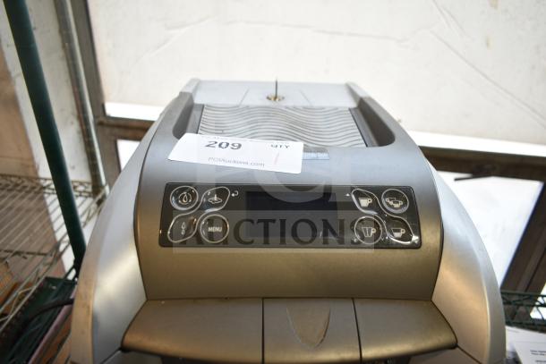 LavAzza 10080632 countertop espresso machine with steam wand, 115 volts, 1 phase, shown with control buttons and display.