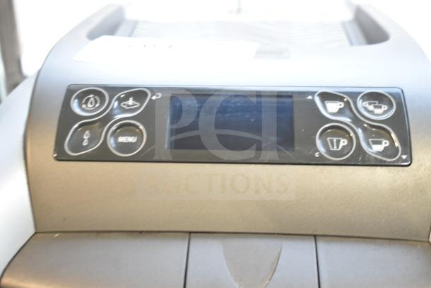 LavAzza 10080632 countertop espresso machine control panel with digital display and various operation buttons.