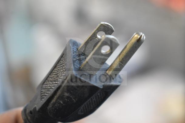 Close-up of a power plug for LavAzza 10080632 Countertop Espresso Machine, 115 Volts, 1 Phase.