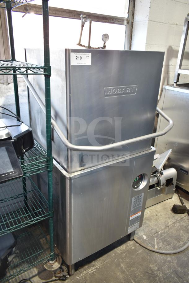 Hobart Commercial Corner Pass Through Dishwasher, stainless steel, pre-owned, model information not visible, item tag marked “210 QTY”.