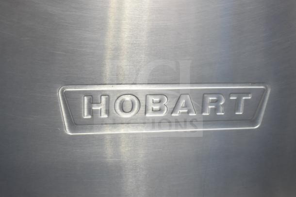 Hobart Commercial Corner Pass Through Dishwasher with etched Hobart logo, stainless steel finish.