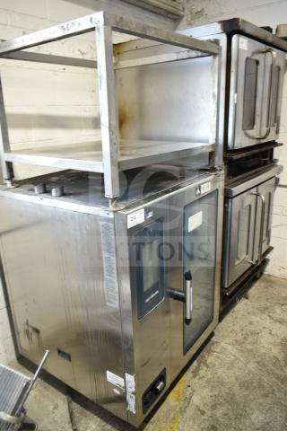 Alto Shaam CTP10-10EVH stainless steel combi convection oven with stand, 208/240V, 3 phase, in used condition.