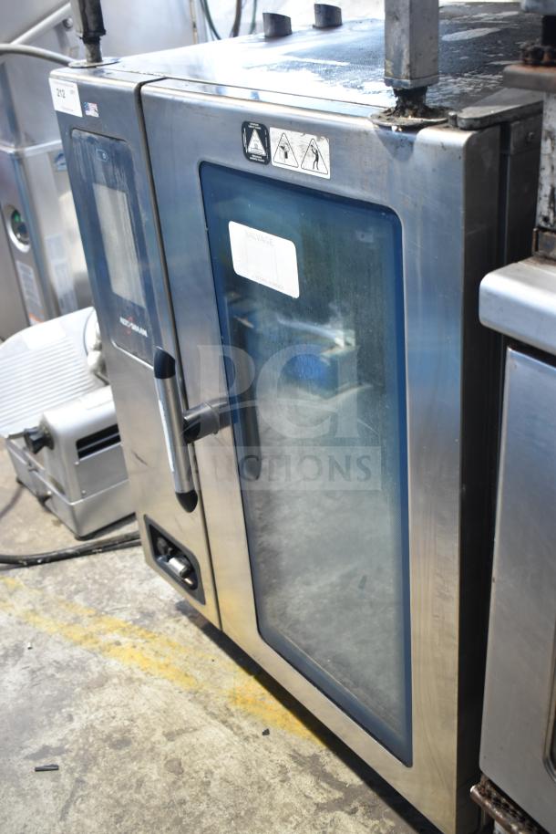 Alto Shaam CTP10-10EVH stainless steel combi convection oven with equipment stand, 208/240V, 3 phase, visible wear.