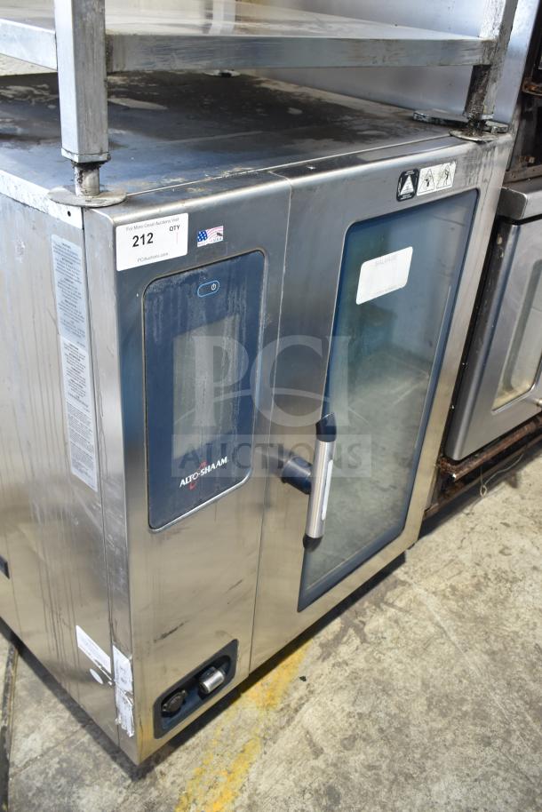 Alto Shaam CTP10-10E combi convection oven with stainless steel finish and equipment stand, showing control panel and door handle.