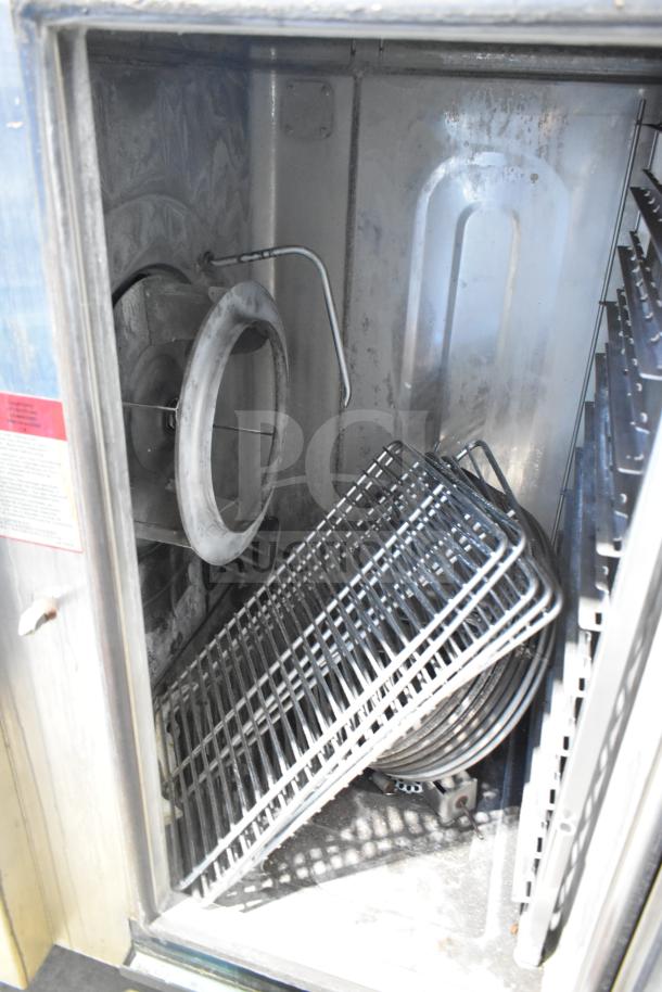 Alto Shaam CTP10-10EVH combi convection oven interior with racks and fan, stainless steel, 208/240V, 3-phase.