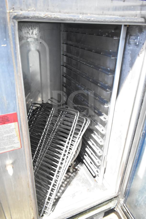 Alto Shaam CTP10-10EVH combi oven interior with racks, stainless steel, 208/240V, 3-phase, used condition.