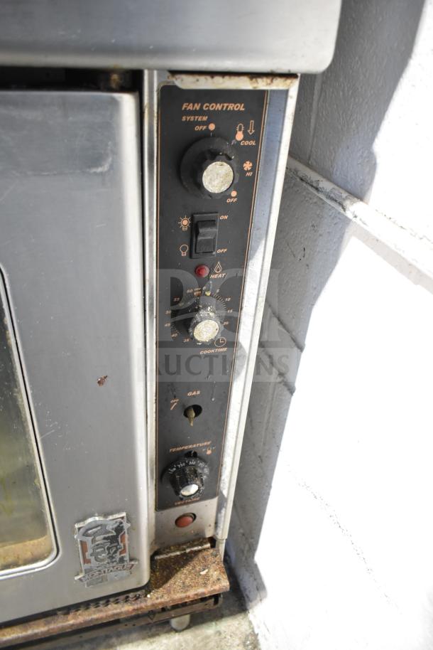 Montague commercial convection oven with view-through doors, thermostatic controls, and visible fan system controls. Moderate wear.