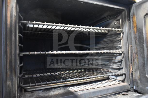 Montague commercial full-size convection oven with view-through doors and thermostatic controls, used condition.