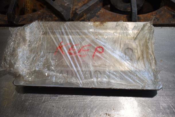 2019 Garland CXPB12 electric clamshell griddle, powered by 208-240 volts, 3 phase. Wrapped with "KEEP" label.