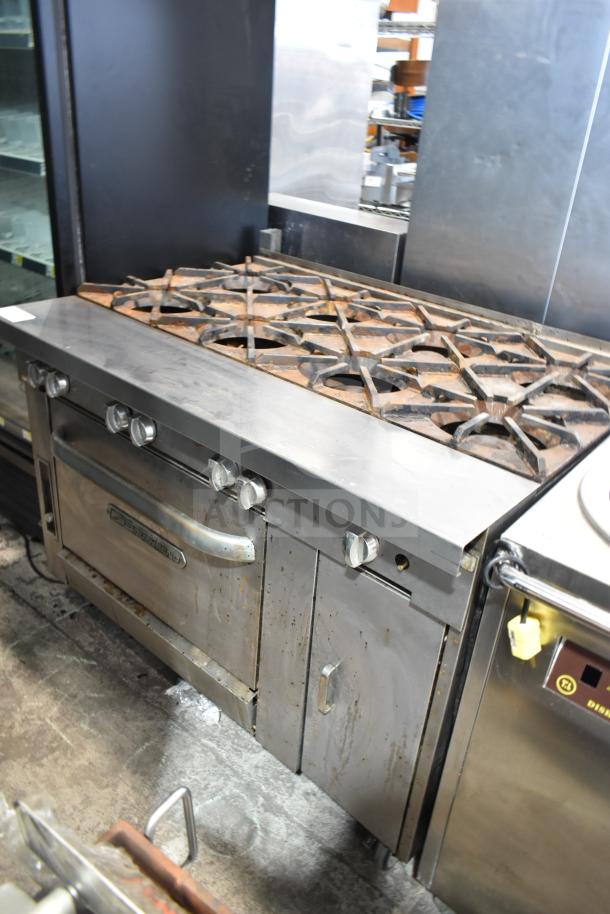 Southbend P48D-BBBB commercial 8 burner gas range with oven, used condition, on casters, stainless steel exterior.