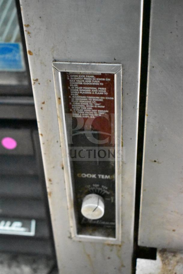 Southbend P48D-BBBB commercial gas range, 8 burners, with oven, temperature control knob visible, on commercial casters.