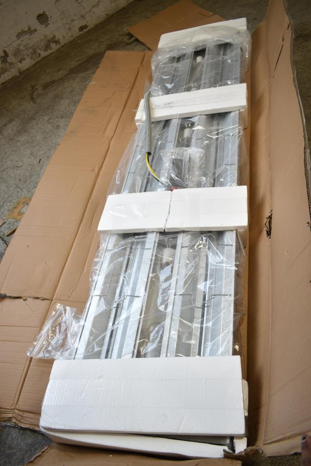 Brand new 2025 ServIt 423SW72TLHDBLA 72" lighted double strip warmer in packaging. Dual toggle controls, 120V, 1 phase.