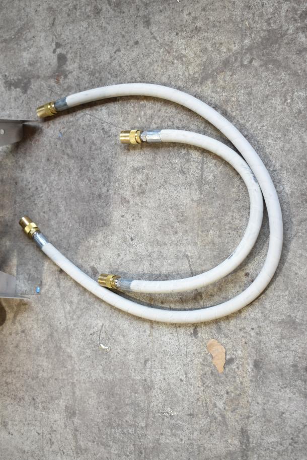 Brand new "The Boss" Shortening Shuttle Handle, scratch and dent condition, featuring durable hoses with brass fittings.