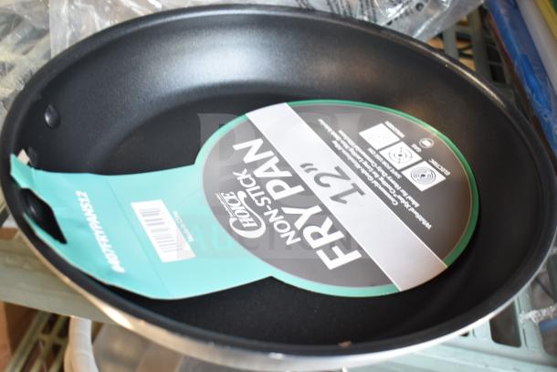 Choice 12" aluminum non-stick fry pan, brand new, visible scratch and dent tag, ideal for versatile cooking.