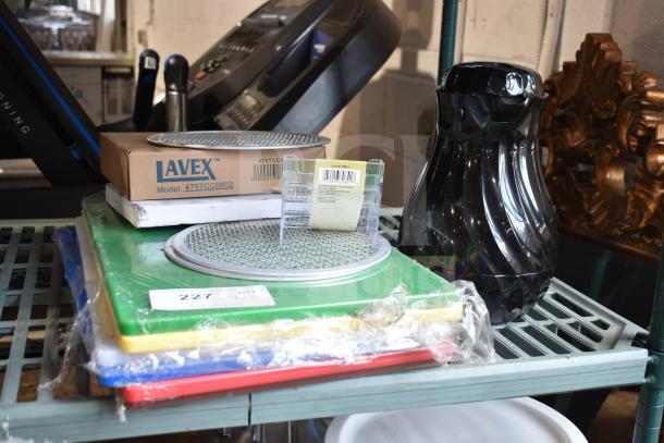 10 new items including Deflecto 4-pocket card holder, Lavex stainless trash chute, Garde chicken slicer blade, cutting boards.