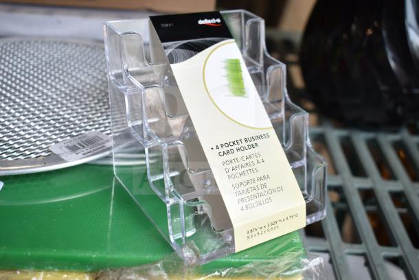 Clear Deflecto 4-pocket business card holder, model 70841, new condition with label, dimensions 3 15/16" x 3 1/2" x 3 3/4".