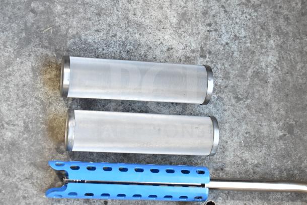 Various new metal and blue plastic items, scratch and dent condition, on concrete surface, part of auction lot.