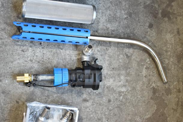 Brand new assorted mechanical parts, including a stainless steel pipe and blue fittings, with minor scratches.