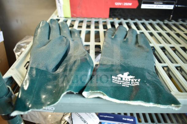 MCR Safety premium PVC gloves, new, nitrile reinforced, labeled "6412," shown on a metal shelf.