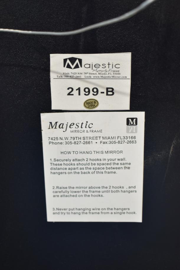 Majestic mirror back with label showing model 2199-B, Made in China, and hanging instructions; good condition.