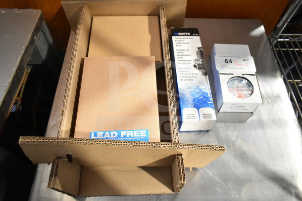 Brand new Hatco C-13 compact booster water heater, boxed, with Watts safety relief valve, water pressure regulator, and ABS leg.