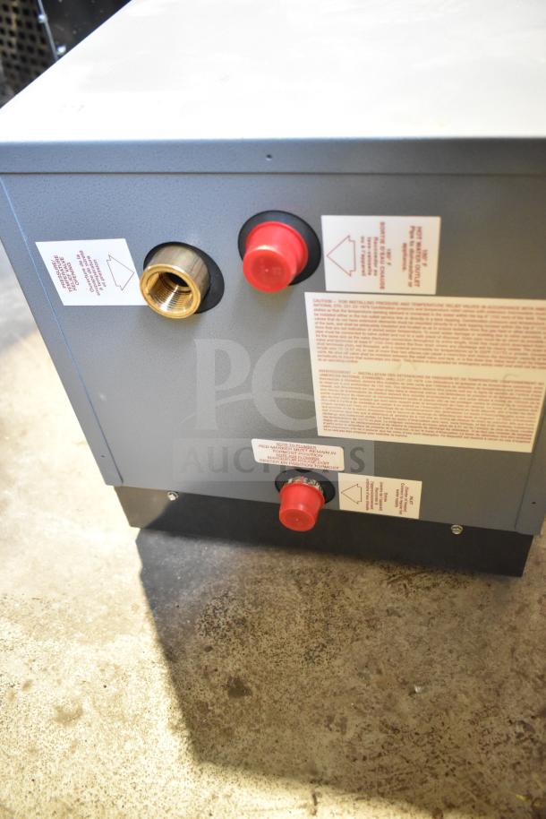 Brand new Hatco C-13 compact booster water heater, 208V, with safety valve, regulator, and ABS leg. Labels visible.