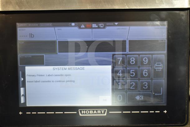 2016 Hobart HTi-7LH commercial food scale, digital display, tested working, label cassette open alert, 120/208-240V, 1 Phase.