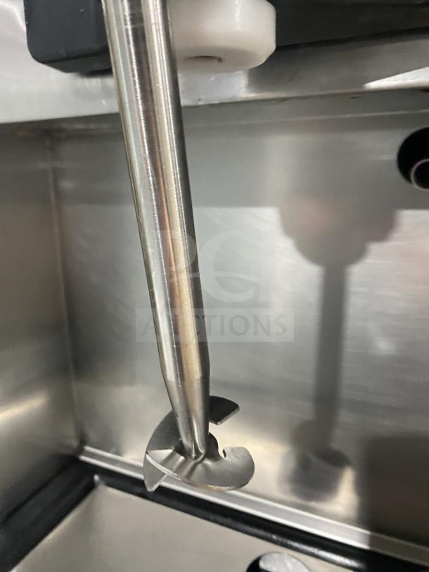 Close-up of Electro Freeze Freedom 360 Series model 78RMT-232 pressurized milkshake machine's stainless steel mixing arm.