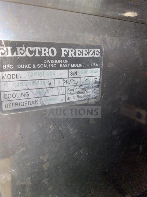 Electro Freeze Freedom 360 Series milkshake machine, Model 78RMT-232. Scratched surface, tag shows voltage and serial number.