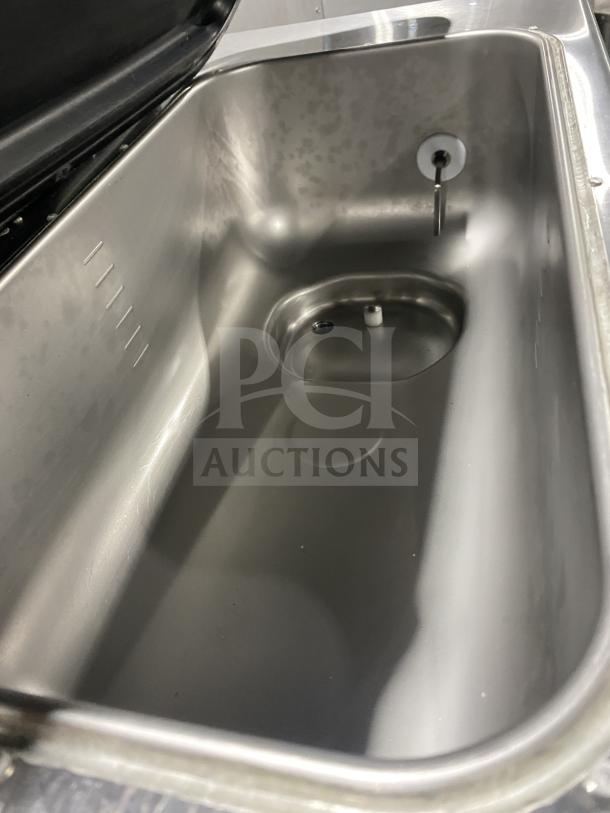 Taylor 342D-27 stainless steel frozen drink machine interior, pristine condition, shown open. Features double flavor capability.