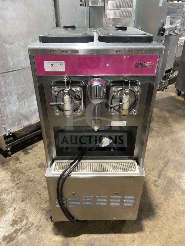 Taylor 342D27 stainless steel commercial frozen drink machine, dual flavors for margaritas and milkshakes, on casters.