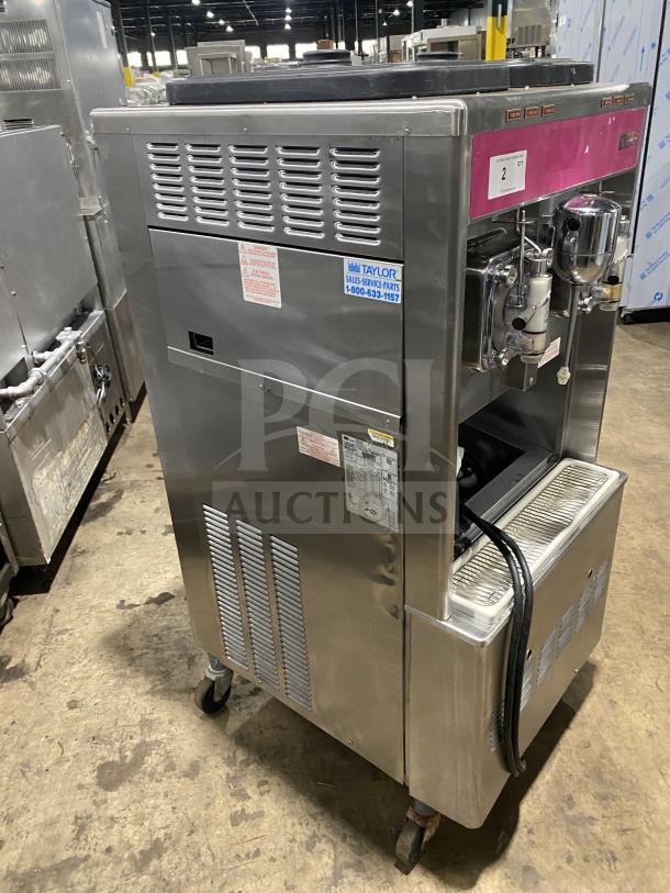 Taylor 342D-27 commercial stainless steel frozen drink machine on casters, double flavor, 208-230V, in good condition.