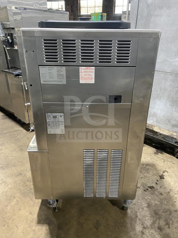 Taylor Dunkin Donuts style stainless steel double flavor frozen drink machine, Model 342D-27, on casters, commercial use.