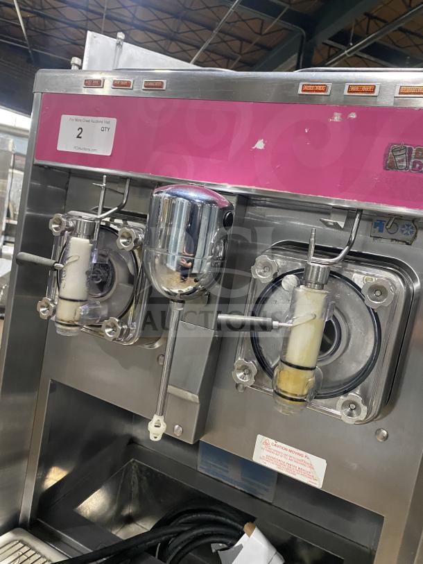 Taylor 342D-27 double flavor frozen drink machine, stainless steel, on casters, for frozen drinks and milkshakes.